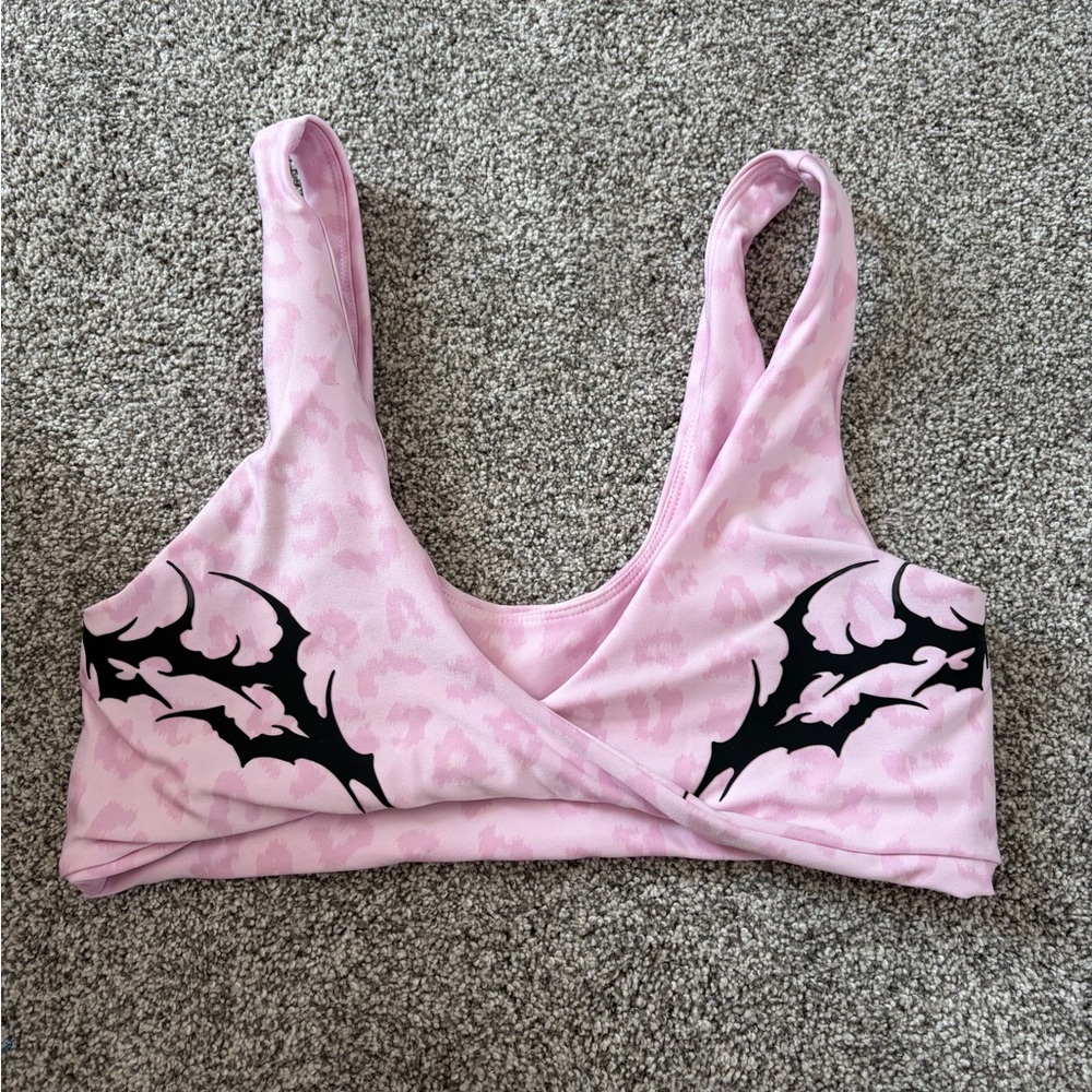 Pink Wrap-Front Sports Bra with Black Graphic Accents